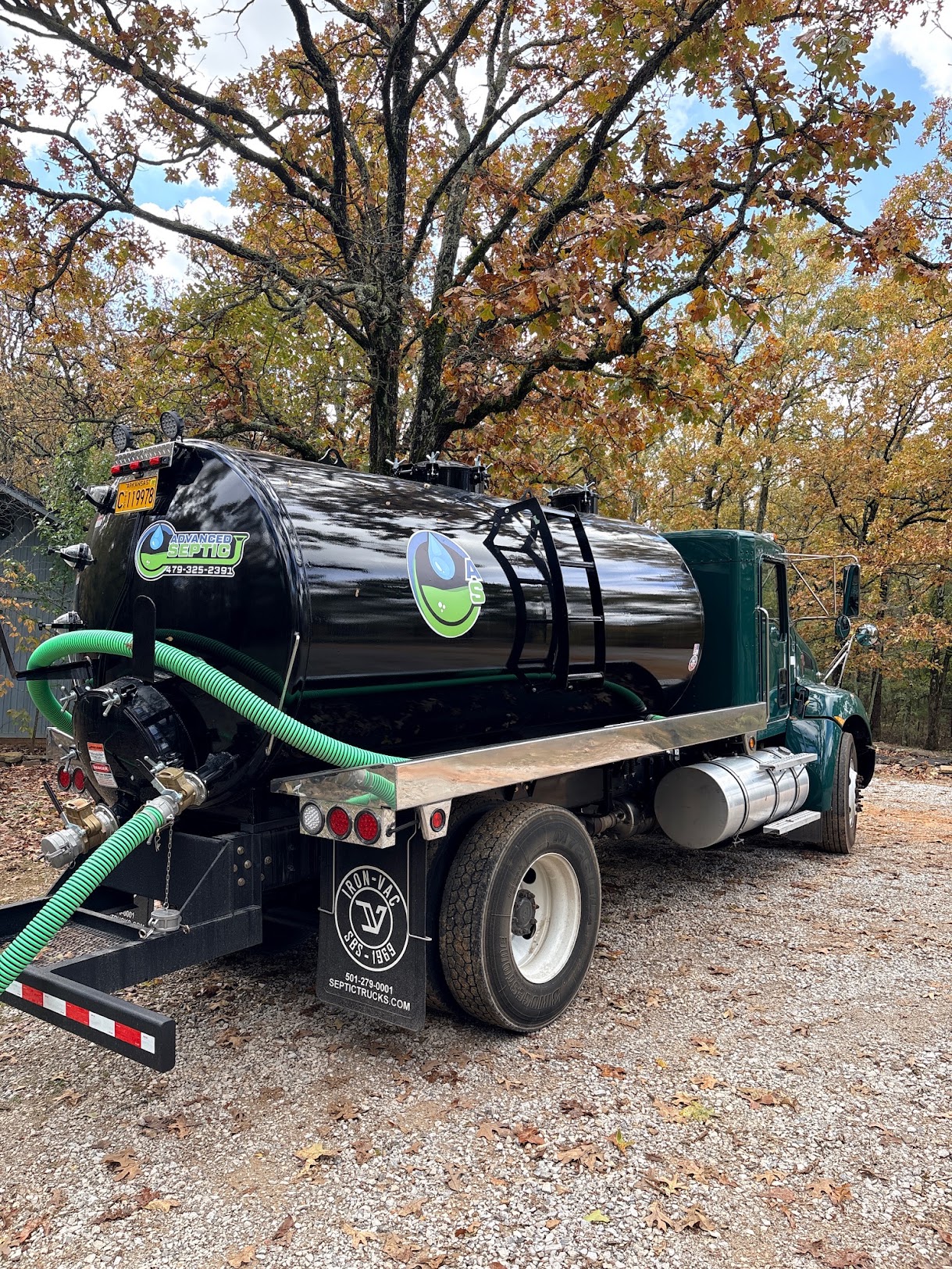 Advanced Septic service truck at a Northwest Arkansas property